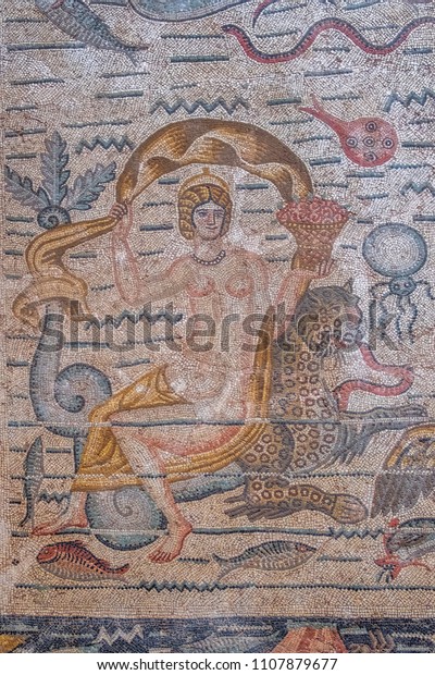 DJEMILA, ALGERIA - APRIL 17, 2018: Nereid, a sea nymph on the mosaic from  roman town Cuicul