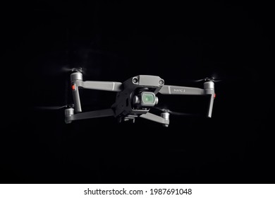 DJI Mavic 2 Pro - Flying in the dark, on black background. Closeup on dark. One of the most portable drones in the market. View on drones gimbal and camera. 12.10.2018 Rostov-on-Don. Russia.