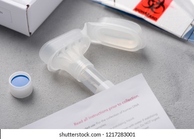 DNA genome saliva ancestry consumer genetic material collection kit - Shutterstock ID 1217283001