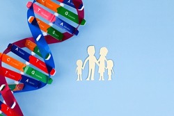 DNA Helix Structure And Family Paper Model. Parents And Children. DNA Carrier Status. Healthcare, Science And Medical Concept.
