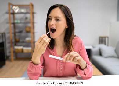DNA Mouth Saliva Test Swab. Woman Doing Check