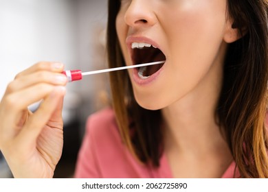 DNA Mouth Saliva Test Swab. Woman Doing Check