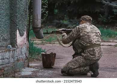 DNIPRO, UKRAINE - April 29, 2022. Teachings Of Territorial Defense. Training Of Military Personnel. Combat Readiness With Weapons Walking Down The Street. Armed Forces Of Ukraine.