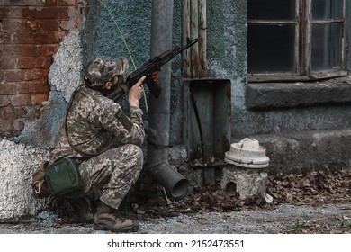 DNIPRO, UKRAINE - April 29, 2022. Teachings Of Territorial Defense. Training Of Military Personnel. Combat Readiness With Weapons Walking Down The Street. Armed Forces Of Ukraine.