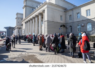 Dnipro, Ukraine - Mar 12, 2022 railway station, aid, refugees, queue, people, families, children, waiting, humanitarian, tent, evacuation