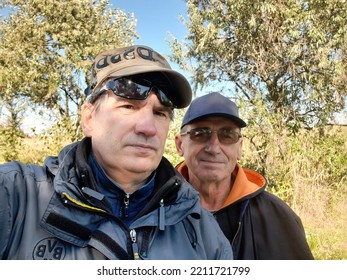 Dnipro, Ukraine, September 2022, Men On A Fishing Trip Have A Photo Session In Nature And Recreation