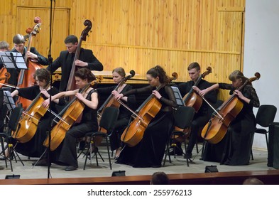 DNIPROPETROVSK, UKRAINE - FEBRUARY 23: Members Of The Youth Symphony Orchestra FESTIVAL Perform At The Conservatory On February 23, 2015 In Dnipropetrovsk, Ukraine