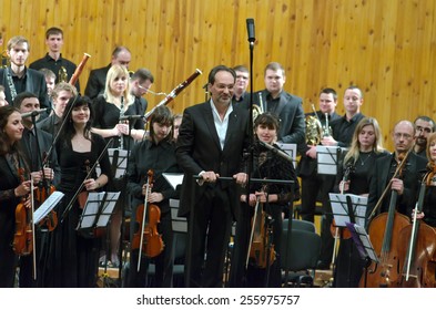 DNIPROPETROVSK, UKRAINE - FEBRUARY 23: Youth Symphony Orchestra FESTIVAL - Main Conductor Dmitry Logvin Perform At The Conservatory On February 23, 2015 In Dnipropetrovsk, Ukraine