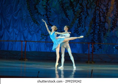 DNIPROPETROVSK, UKRAINE - JUNE 27, 2015: Dancers Julia Zakharenko And Alex Belan Perform The Adagio Nino Rota At State Opera And Ballet Theatre. 