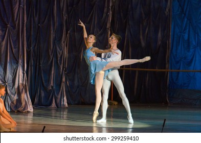 DNIPROPETROVSK, UKRAINE - JUNE 27, 2015: Dancers Julia Zakharenko And Alex Belan Perform The Adagio Nino Rota At State Opera And Ballet Theatre. 