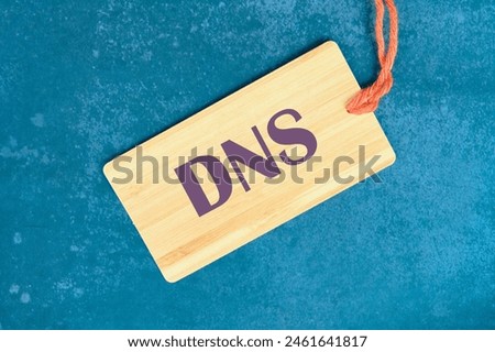 DNS Domain Name System Server Decentralized naming system for computers, devices, services, other resources on the card on an abstract background