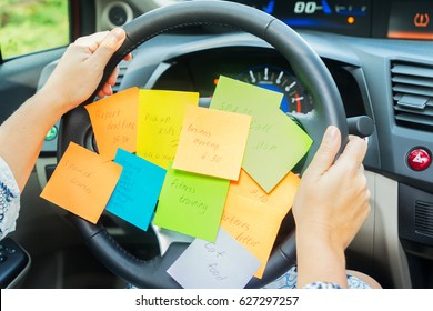 To Do List In A Car On Driving Wheel - Busy Day Concept