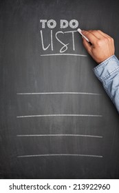 To do list concept on black Blackboard