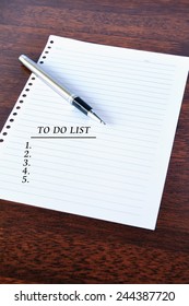 to do list text write on a notepad with pen