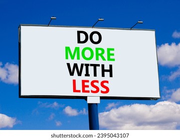 Do more with less symbol. Concept word Do more with less on beautiful big white billboard. Beautiful blue sky cloud background. Business do more with less concept. Copy space. - Shutterstock ID 2395043107