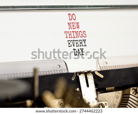 Do new things every day words symbol. Concept words Do new things every day typed on old retro typewriter. Beautiful white background. Business do new things every day concept. Copy space