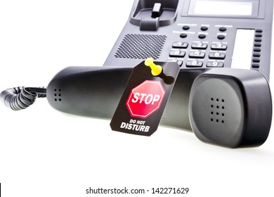 Do Not Disturb Label With A Thumbtack And Office Phone With A Phone Tube. Do Not Disturb With Your Calls Concept. Isolated On White.