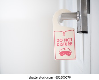 Do Not Disturb Sign Hanging On A Door Handle For Private Time Moment Of Hotel And Resort Bedroom Background