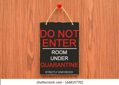 Do Not Enter Room Under Quarantine Sign On Wood Door