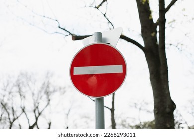 do not enter sign on the road with tree on background - Shutterstock ID 2268293011