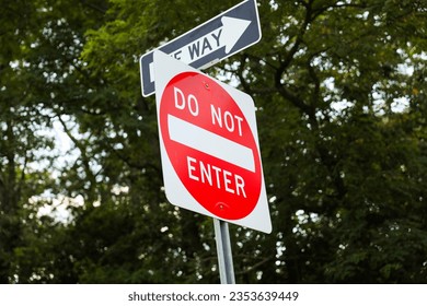 Do Not Enter sign signifies restricted access, a barrier against unwanted paths, emphasizing safety, control, and prohibition in its symbolic message - Shutterstock ID 2353639449