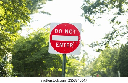 Do Not Enter sign signifies restricted access, a barrier against unwanted paths, emphasizing safety, control, and prohibition in its symbolic message - Shutterstock ID 2353640047
