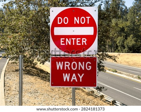 Do Not Enter And Wrong Way Traffic Signs Near Highway Ramp