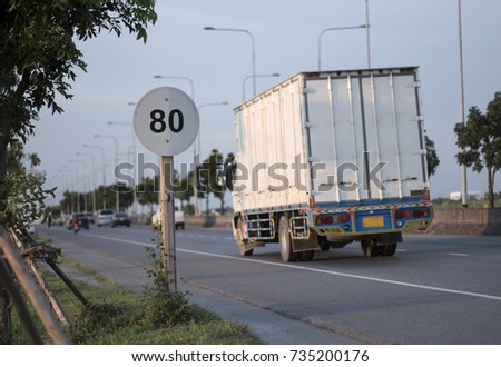 Do not exceed 80km/h sign on the road