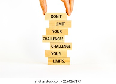 Do Not Limit Your Challenges Symbol. Wooden Blocks With Words Do Not Limit Your Challenges. Challenge Your Limits. Beautiful White Background, Copy Space. Businessman Hand. Business Concept.