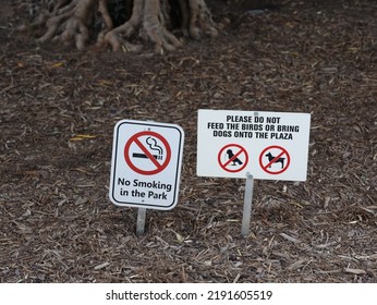 Do Not Smoke In The Park And Do Not Feed Animals No Pet Signs