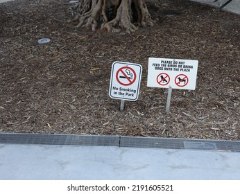 Do Not Smoke In The Park And Do Not Feed Animals No Pet Signs