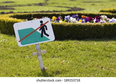 Do not step on grass in a park