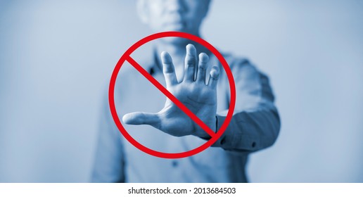 Do Not Touch Hands To Prevent Corona Virus, Stay Away And Do Not Touch Me Concept,Close Up Of Poor Beaten Depressed Man Holding Hand In Front,hands And Doing Stop Gesture With Sad And Fear Expression.