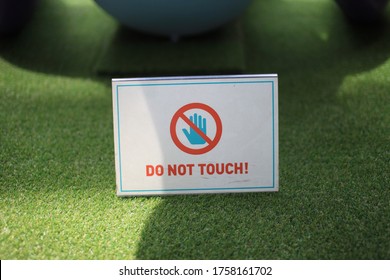 
Do Not Touch Over The Meadow Sign