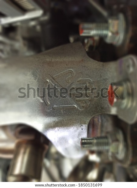 the do\
not touch symbol on the exhaust manifold\
cover