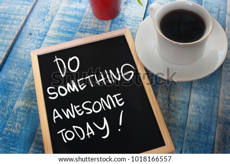Do Something Awesome Today. Motivational inspirational quotes words. Wooden background