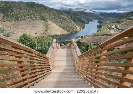 Passadiços do Côa, a wooden structure with a length of 930 meters and 890 steps, with the Douro River in the background in Foz Côa, Portugal on a cloudy day