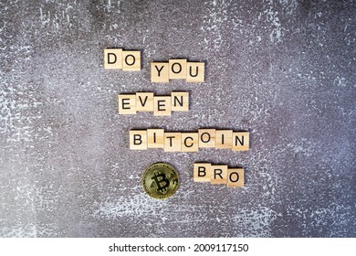 Do you even Bitcoin bro, funny sign about cryptocurrency with wooden blocks and BTC coin on concrete background - Shutterstock ID 2009117150