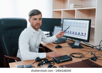 Do You Feel Anxiety, Results Shows That You Are. Polygraph Examiner Works In The Office With His Lie Detector's Equipment.