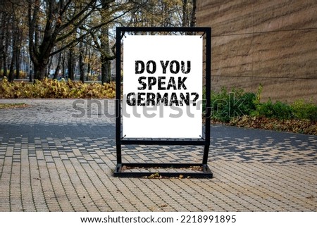 Do you speak German. Text with a question on a poster.