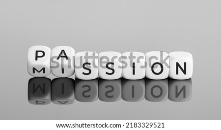Do your mission with passion concept. Flipping cube blocks with words