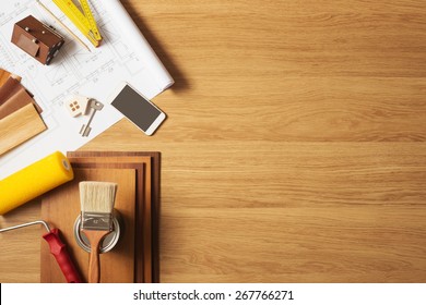 Do It Yourself Home Remodeling And Renovation Concept, Work Table Top View With Copyspace And Tools Top View