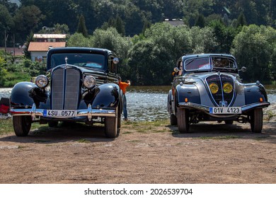 Dobrichovice, Czech Republic - August 14th 2021: Two Historic Old Cars Facing The Camera At Car Show Veterani Pod Zamkem 2021.