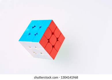 Dobrush, Belarus - 3 February 2019. Rubics Cube On White Background, Top View