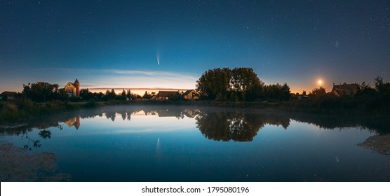 Dobrush, Belarus. Comet Neowise C2020f3 Anf Rising Moon In Night Starry Sky Reflected In Small Lake Waters - Powered by Shutterstock