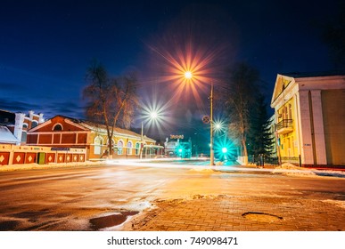 Dobrush, Belarus - January 29, 2017: Night street of a provincial town on a winter evening