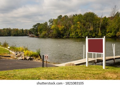 Dock And Boat Launch On The Seneca River In Autumn