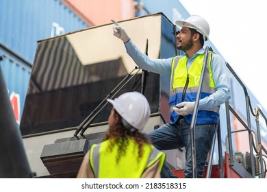 Dock manager and engineer worker discuss on quality at container shipping yard during truck lifting cargo box. Import and export product. Manufacturing transportation and global business concept