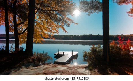 Dock On A Lake In The Fall Season