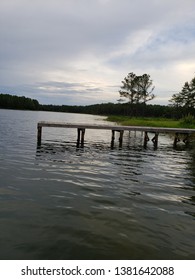 Dock On A Lake Nesr Fort Jackson, SC. Cloudy Day.